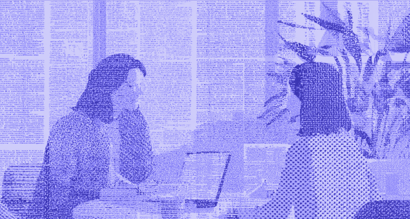 Financial advisor meeting with a client in an office.