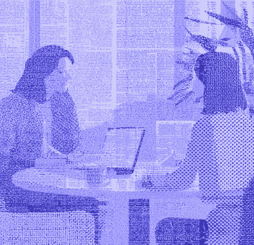 Financial advisor meeting with a client in an office.